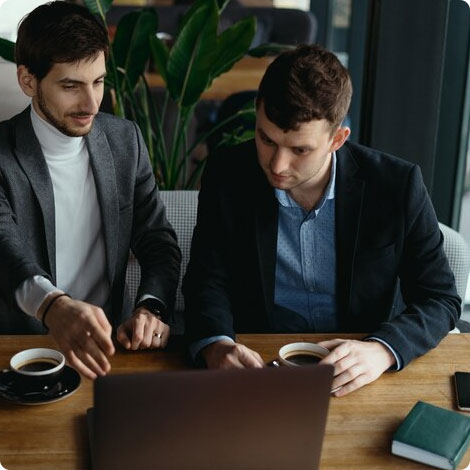 Two people discussing employee satisfaction