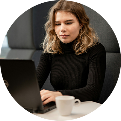 Woman using a laptop while working